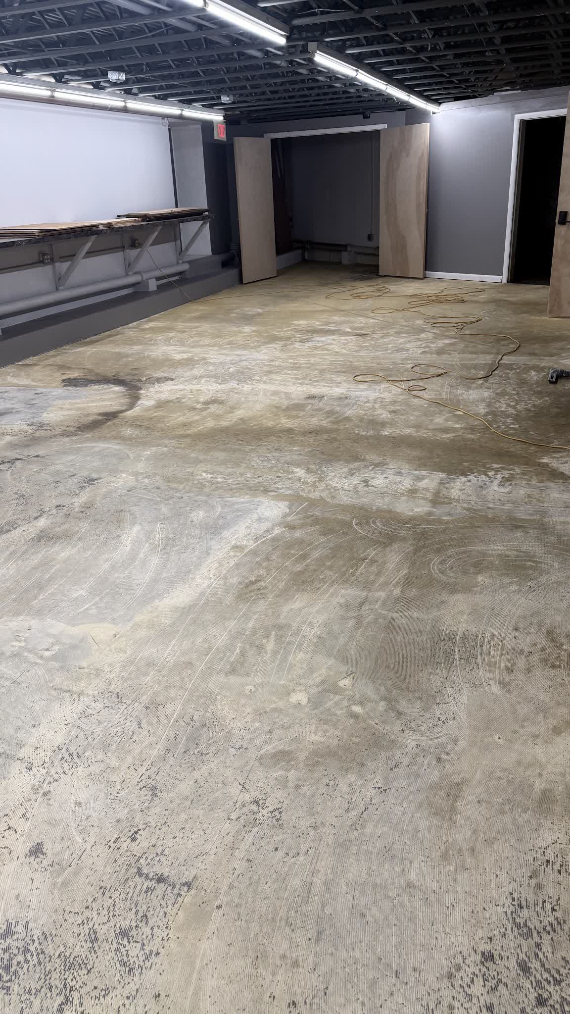 Assessment: carpet glue, followed by cutback mastic underneath