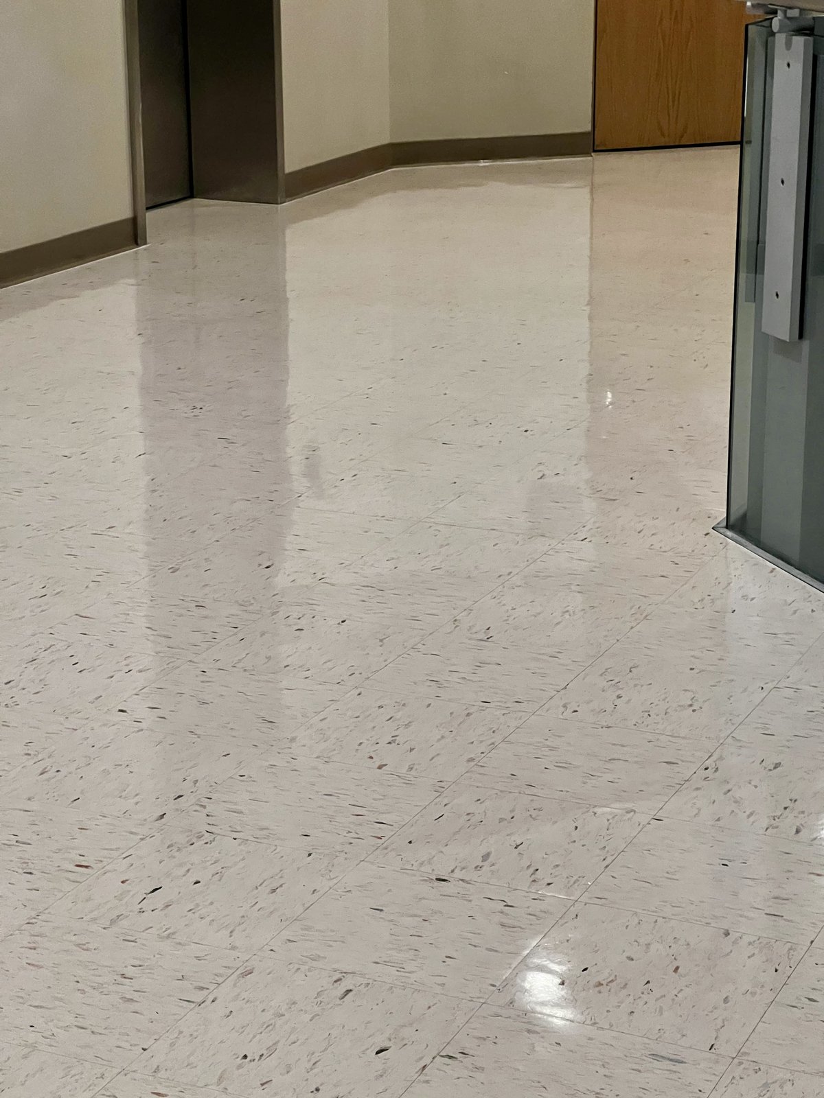 Lobby elevator area VCT after high-gloss refinish