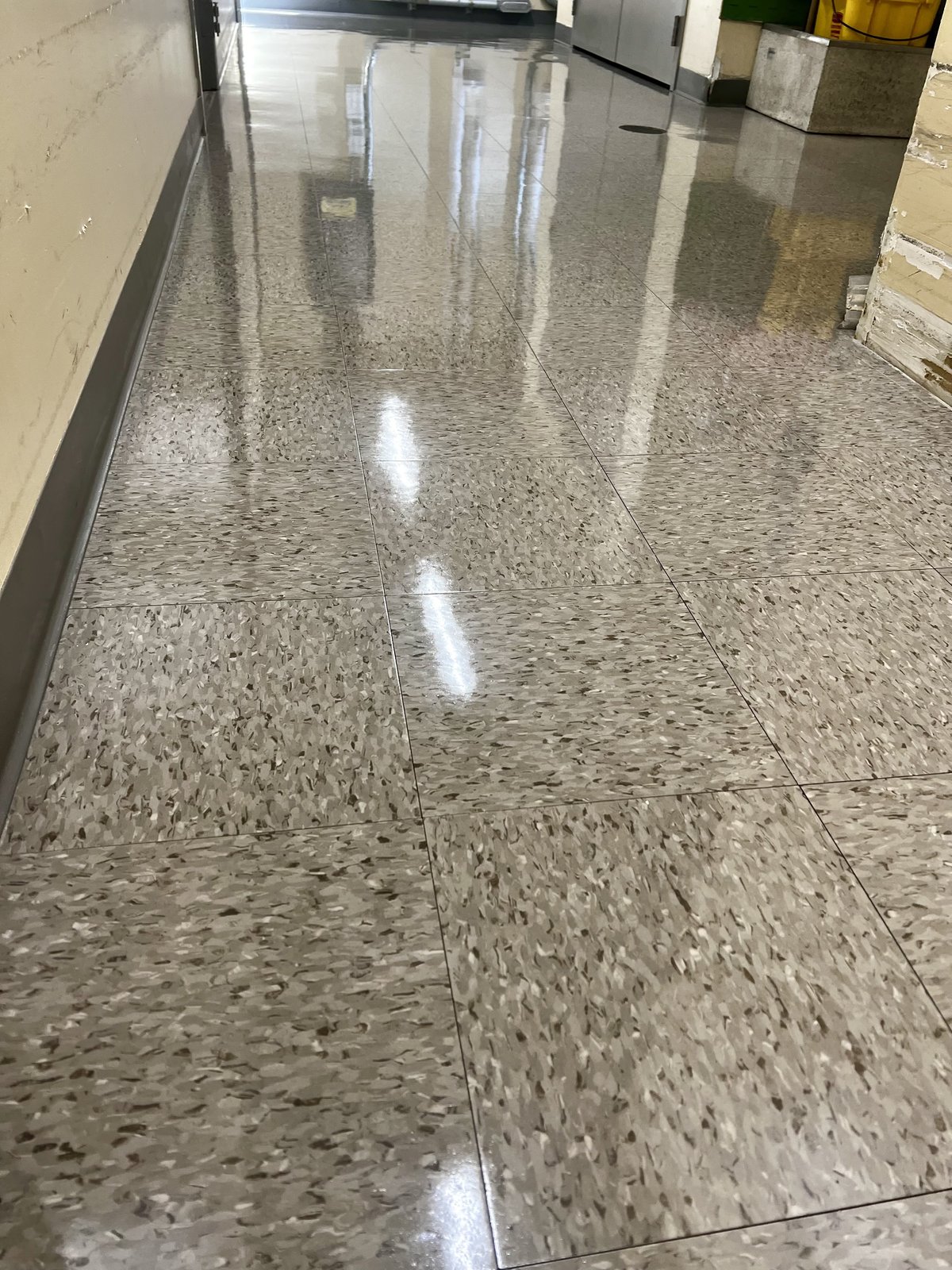 Long corridor grey VCT after refinish
