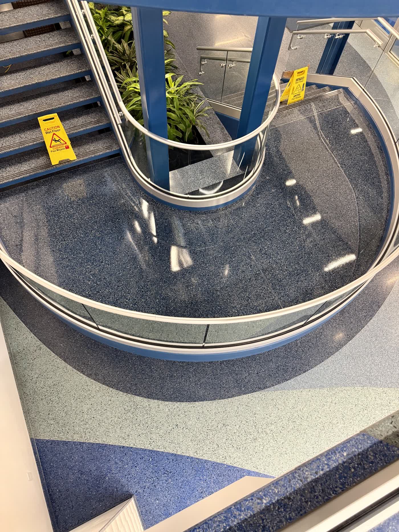 Deep blue terrazzo staircase landing after Contro restoration
